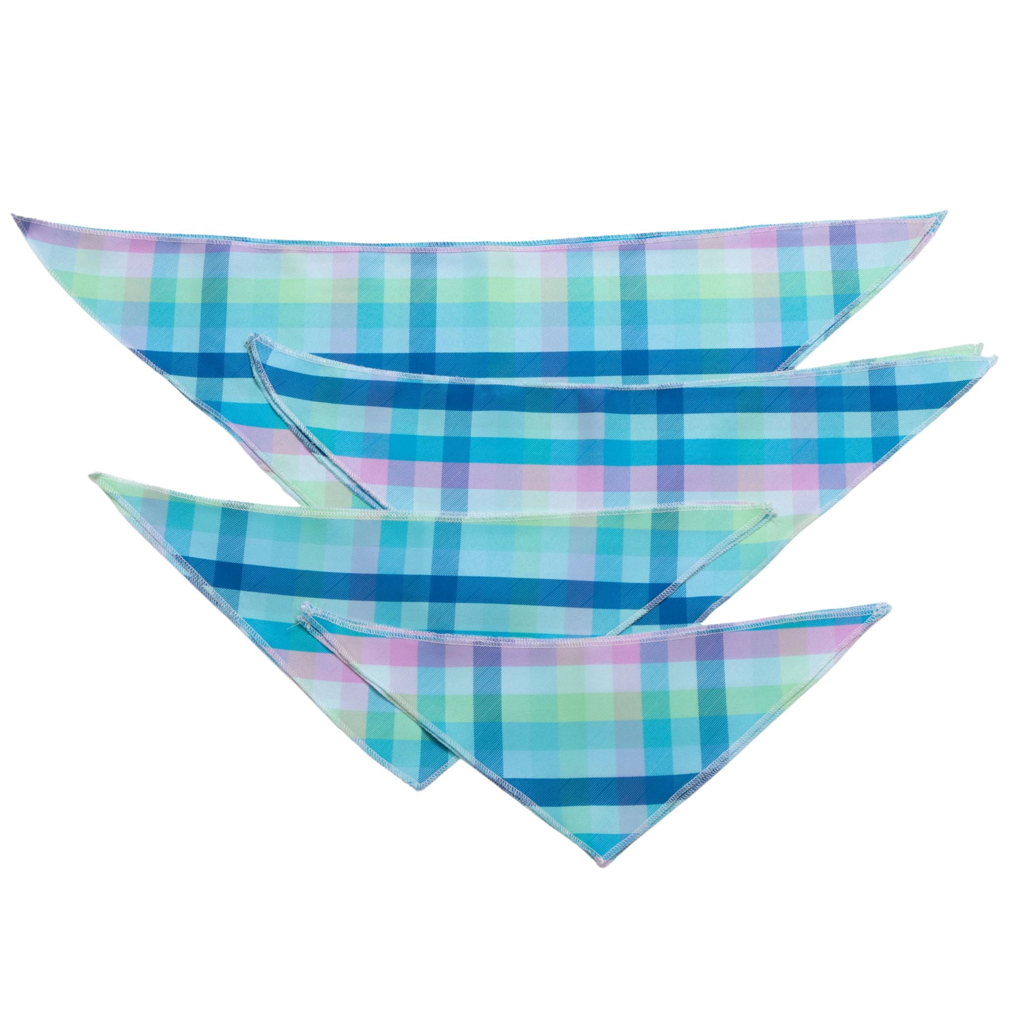 Set of three plaid bandanas in blue, green, and pink on a white background