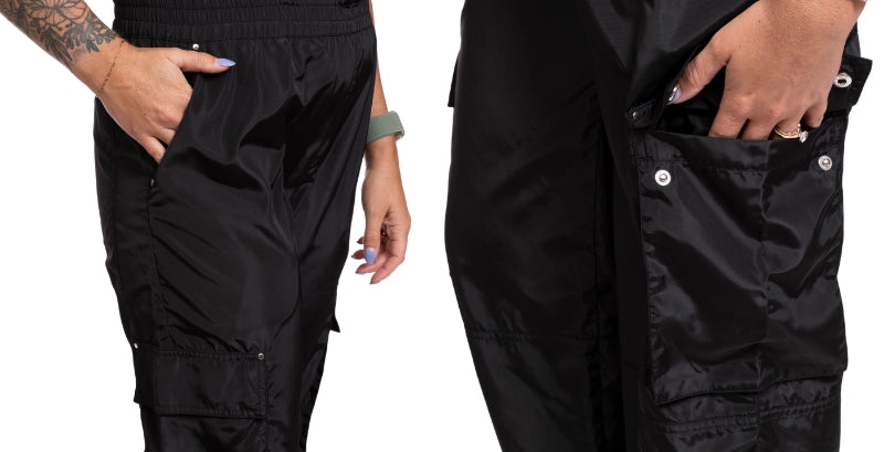 Retro Stylist Wear's hair resistant and water resistant black Lana jumpsuit showing cargo pockets and side pockets